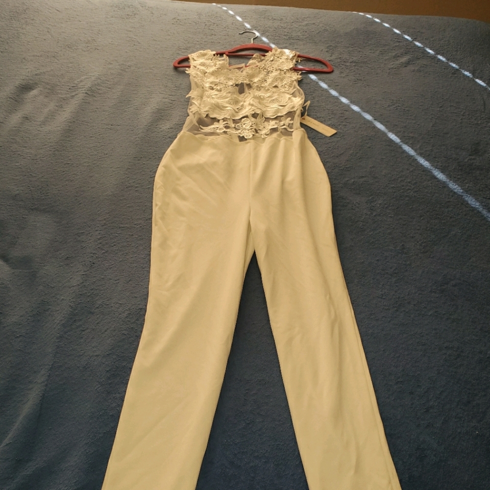 White jumpsuit. Never use M